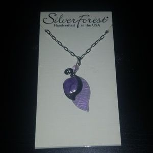 Necklace with leaf pendant